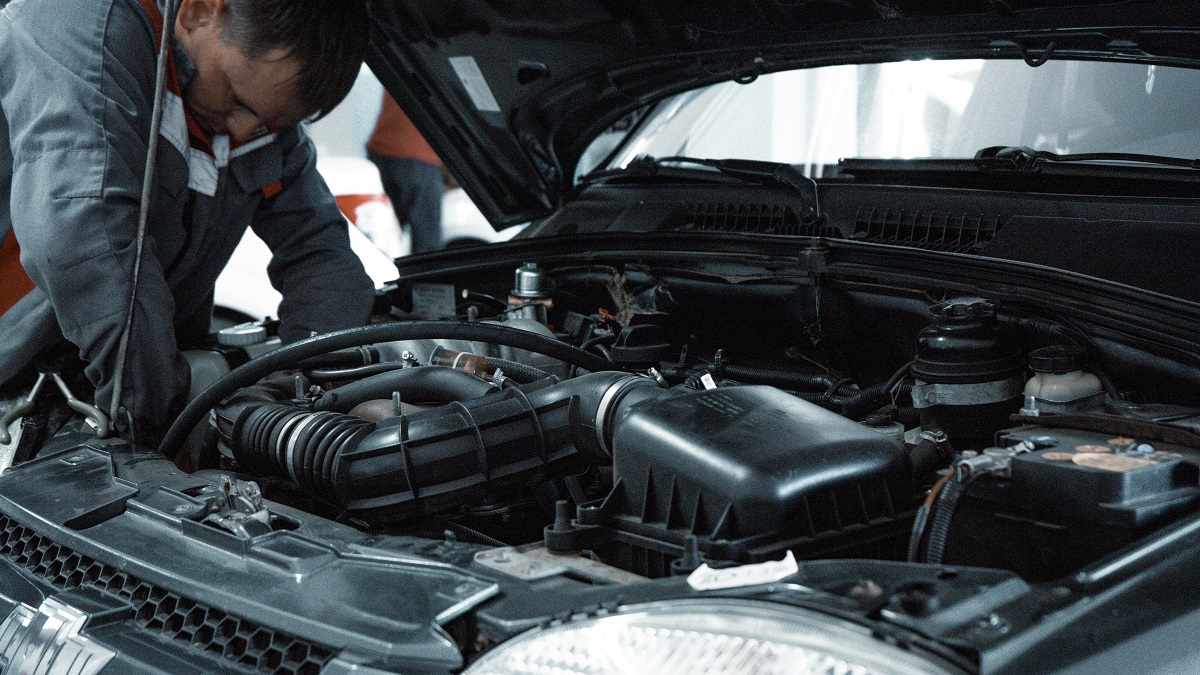 mechanic repairing a car